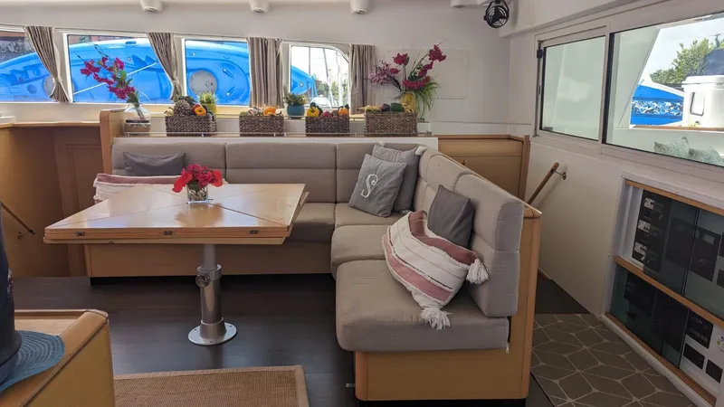 Sandstar Yacht Photos Pics Interior of 2009 Lagoon 500 yacht with cozy seating and decorative accents.