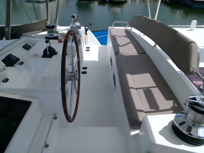 Sandstar Yacht Photos Pics Lagoon 500 catamaran helm station with wheel and seating, 2009 model.