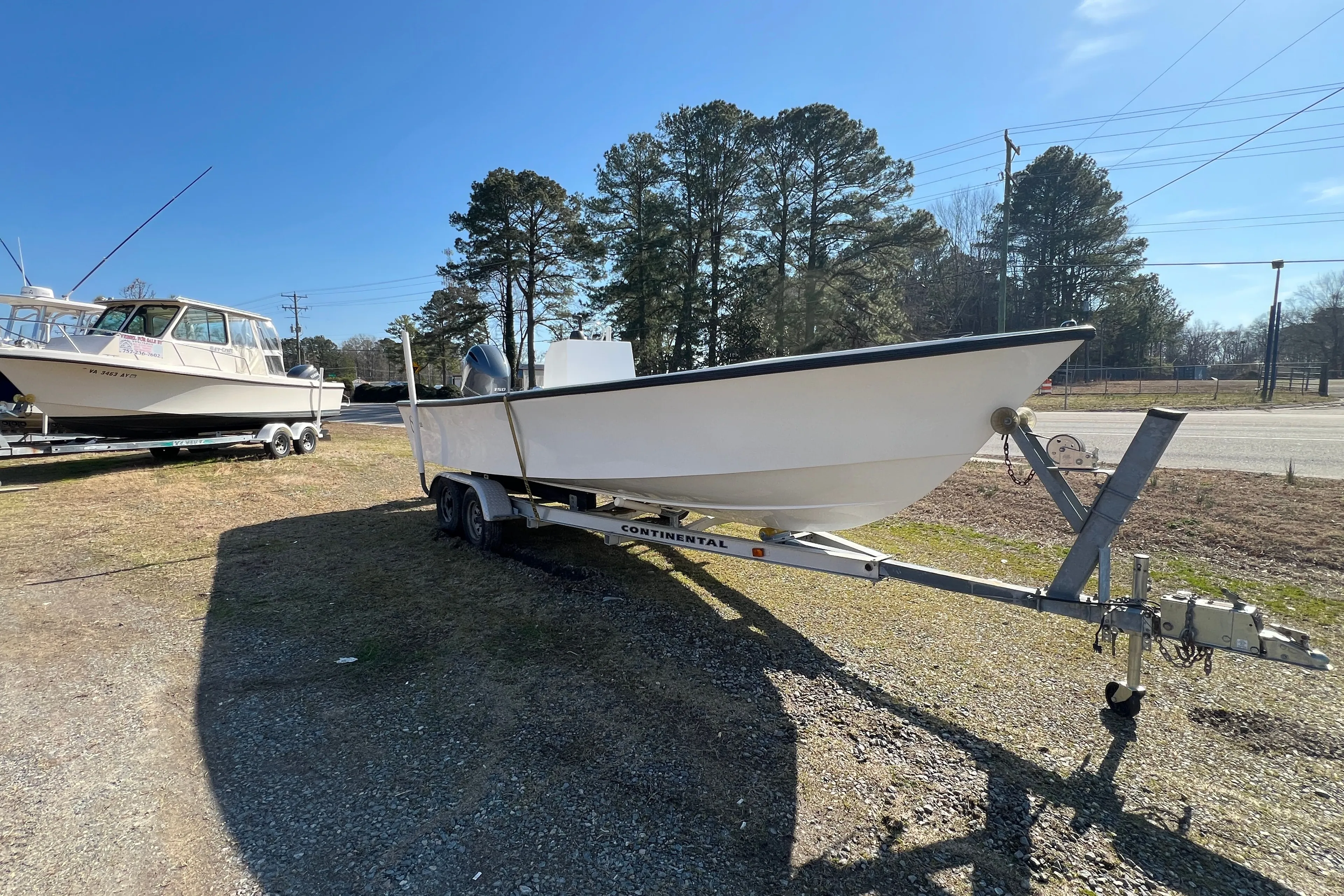 2025 C-Hawk 22 Center Console on trailer outdoors.