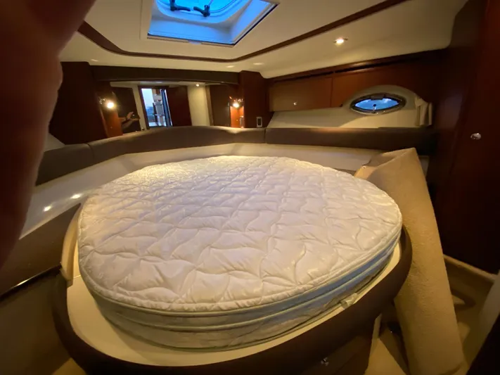 Lucid Dreams Yacht Photos Pics Luxurious 2014 Meridian 441 Sedan yacht interior with round bed and skylight.