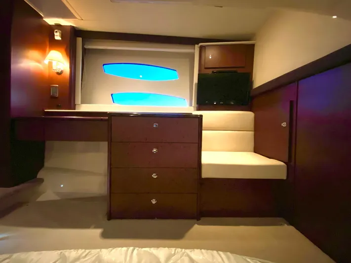 Lucid Dreams Yacht Photos Pics Luxurious interior of 2014 Meridian 441 Sedan yacht with elegant wood finish.