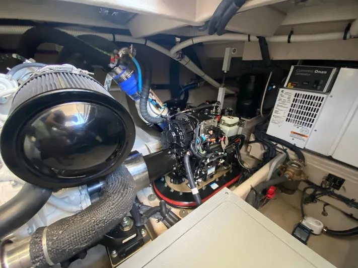 Lucid Dreams Yacht Photos Pics Engine room of 2014 Meridian 441 Sedan with Cummins Onan generator.