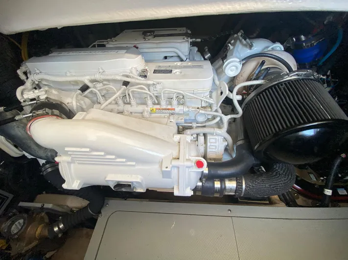 Lucid Dreams Yacht Photos Pics Engine of 2014 Meridian 441 Sedan yacht, showcasing intricate mechanical components.