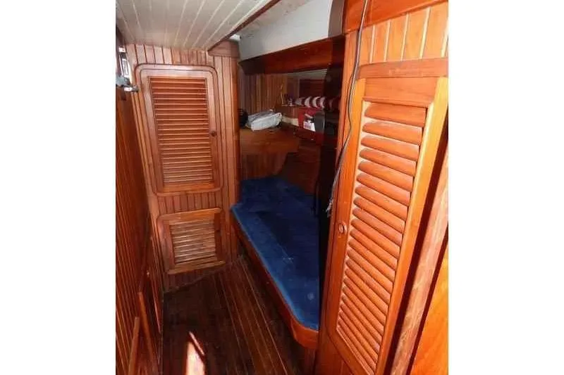 Sacred Space Yacht Photos Pics Cozy wooden cabin interior of 1992 Hans Christian Christina sailboat.