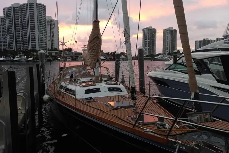 Sacred Space Yacht Photos Pics Sailboat docked at marina during sunset, Hans Christian Christina 1992 model.