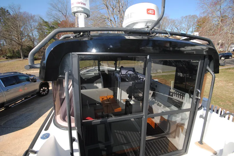  Yacht Photos Pics 2015 XO Boats 270 RS, exterior view, showcasing sleek design and modern navigation equipment.