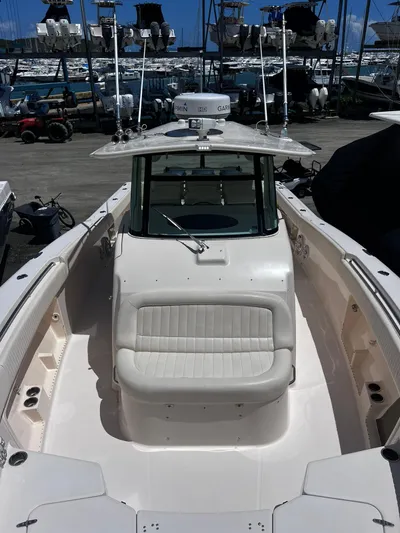  Yacht Photos Pics 2012 Grady-White 366 Canyon boat docked at a marina.