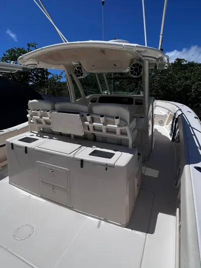  Yacht Photos Pics 2012 Grady-White 366 Canyon boat interior with helm and seating area.