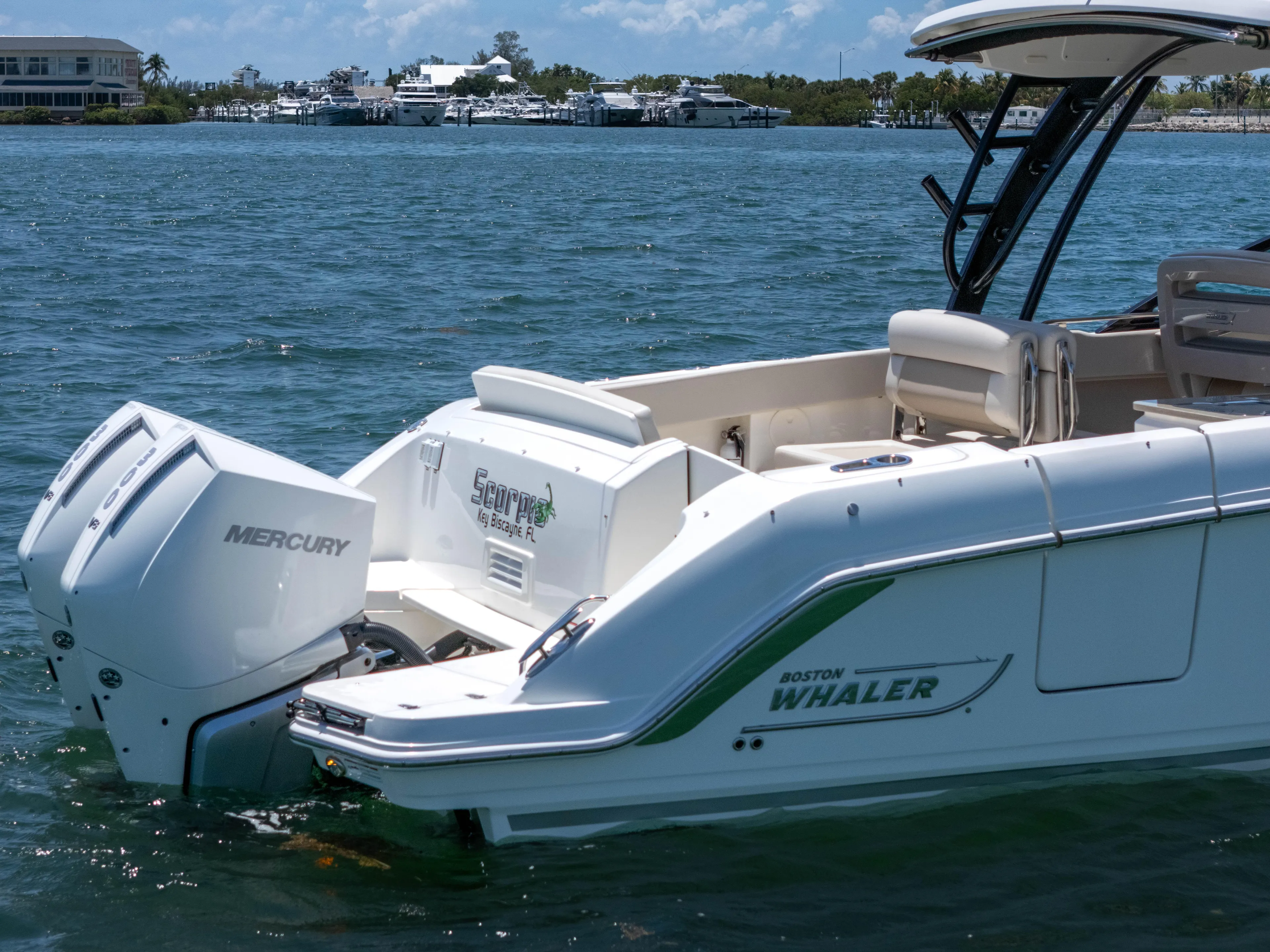  Yacht Photos Pics 2024 Boston Whaler 325 Vantage boat with Mercury engines on the water.