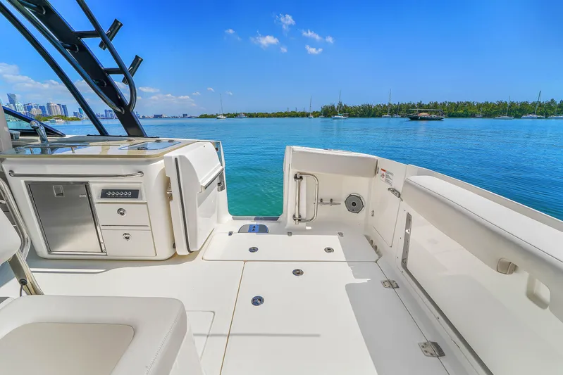  Yacht Photos Pics 2024 Boston Whaler 325 Vantage boat interior with ocean view.