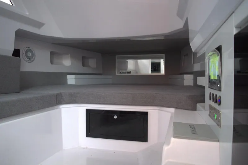  Yacht Photos Pics Interior of 2025 DNA 46 boat cabin with modern design and control panel.