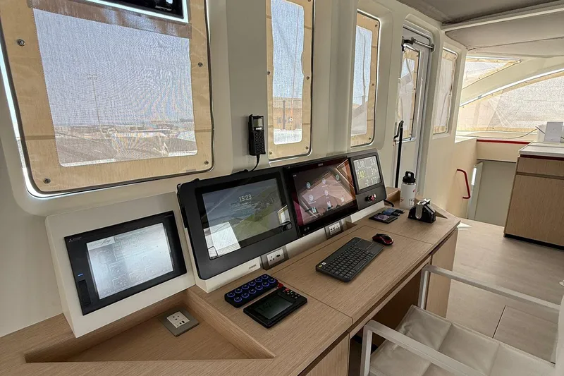 Highland Fling 18 Yacht Photos Pics Modern helm station of 2023 Gunboat 80 yacht with advanced navigation displays.