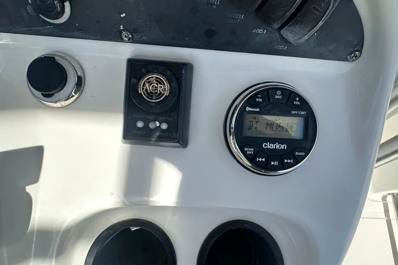 Block It Out Yacht Photos Pics Control panel of a 2005 Boston Whaler 320 Outrage with Clarion audio system.