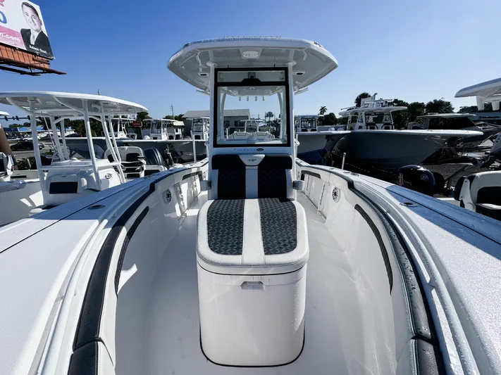  Yacht Photos Pics 2023 Tidewater 282cc Adventure Bluewater boat, sleek design, spacious deck, modern features.