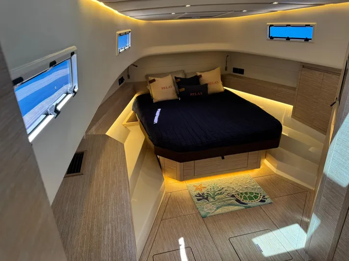  Yacht Photos Pics Luxurious interior cabin of 2022 Pardo Yachts 43 with ambient lighting and modern design.