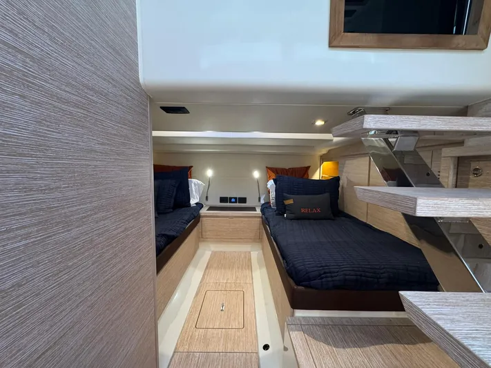  Yacht Photos Pics Cabin interior of 2022 Pardo Yachts 43 with twin beds and modern design.