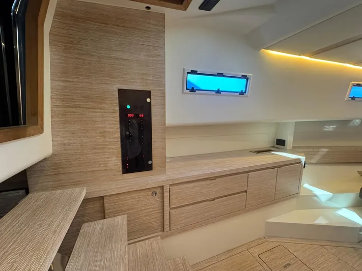  Yacht Photos Pics Interior of 2022 Pardo Yachts 43, featuring modern wood cabinetry and sleek design elements.