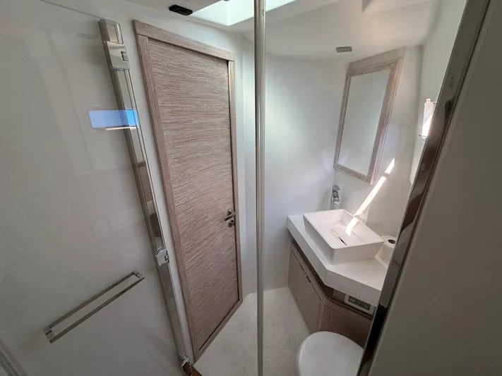  Yacht Photos Pics Modern bathroom interior on 2022 Pardo Yachts 43, featuring sleek design and fixtures.