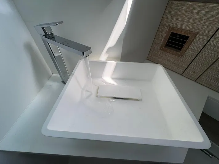  Yacht Photos Pics Modern sink with sleek faucet in 2022 Pardo Yachts 43 model bathroom.