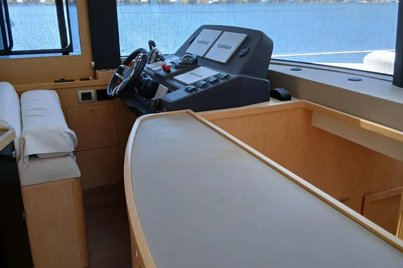  Yacht Photos Pics Interior helm of 2022 Sirena 58 yacht with modern navigation equipment.