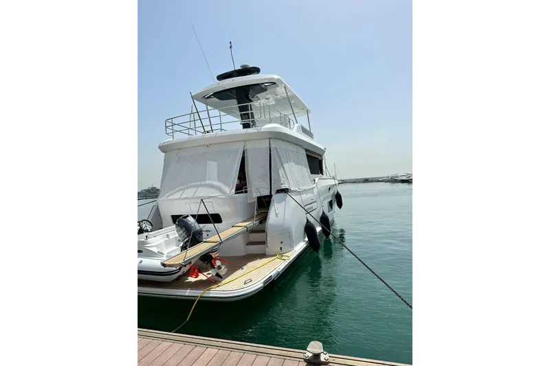  Yacht Photos Pics Luxury Sirena 58 yacht docked at marina, 2022 model.