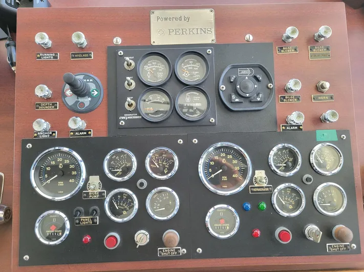 Resolute Yacht Photos Pics Control panel of a 1987 Custom Pilgrim Tribute boat with Perkins engine gauges and switches.