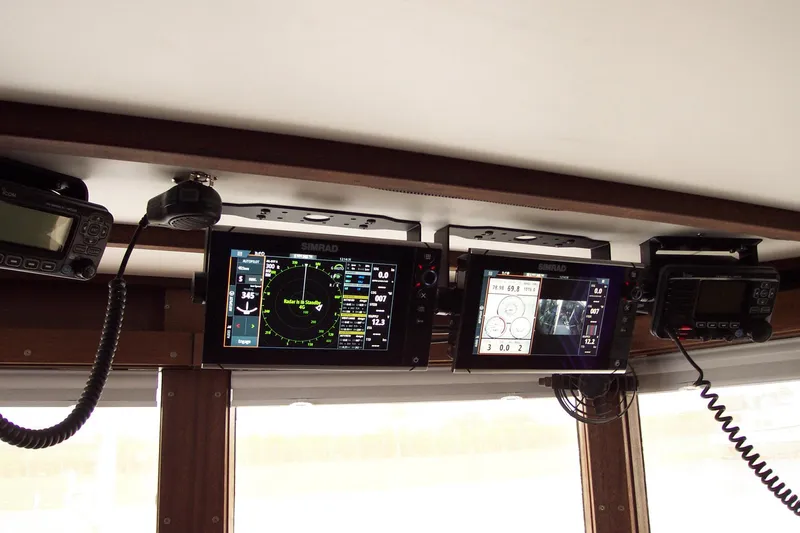 Resolute Yacht Photos Pics 1987 Custom Pilgrim Tribute boat navigation equipment with radar and communication displays.