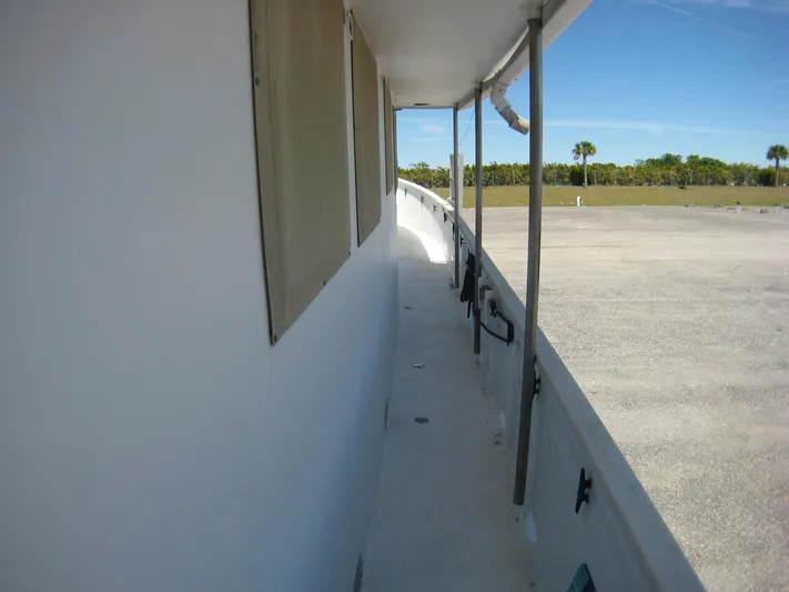 Resolute Yacht Photos Pics Side view of 1987 Custom Pilgrim Tribute boat docked on a sunny day.
