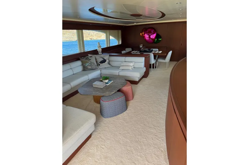  Yacht Photos Pics Luxurious interior of 2011 Falcon 90 yacht with elegant seating and modern decor.