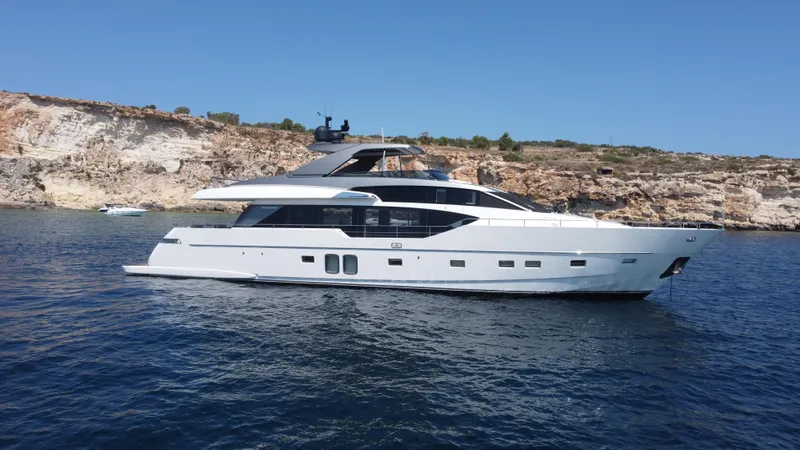  Yacht Photos Pics Luxury 2018 Sanlorenzo SL86 yacht cruising near rocky coastline.