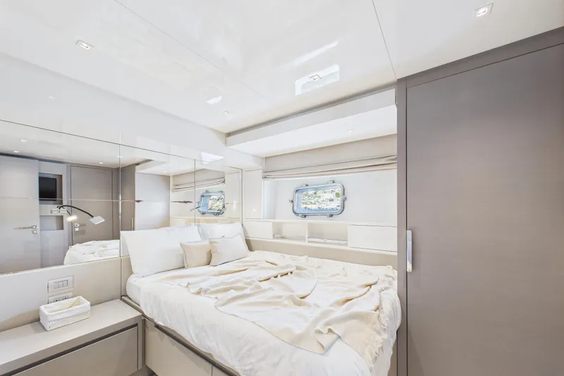  Yacht Photos Pics Luxurious bedroom interior of 2018 Sanlorenzo SL86 yacht, featuring modern design and elegant decor.