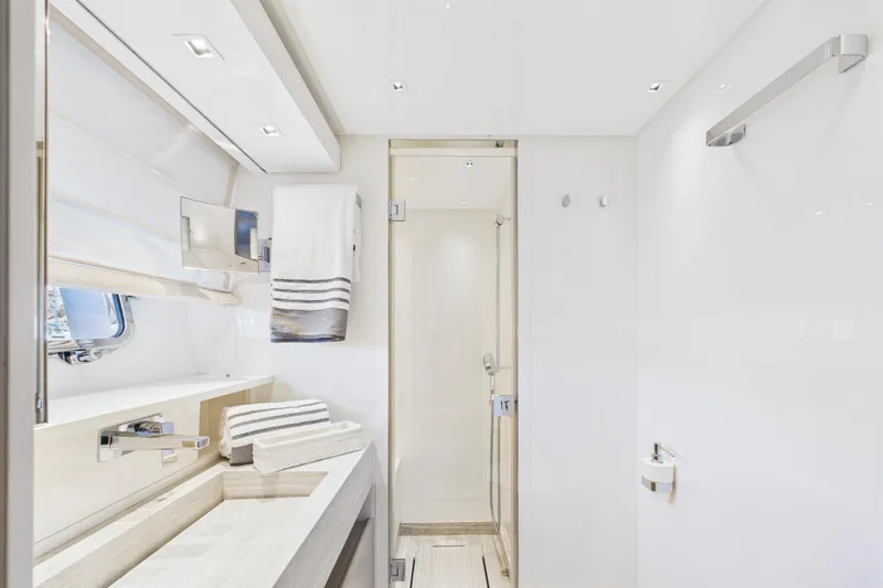  Yacht Photos Pics Luxurious bathroom interior of 2018 Sanlorenzo SL86 yacht, featuring modern fixtures and elegant design.