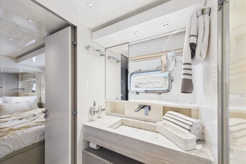  Yacht Photos Pics Luxurious bathroom interior of 2018 Sanlorenzo SL86 yacht with modern fixtures and elegant design.