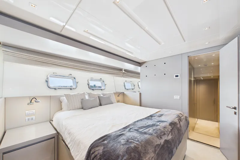  Yacht Photos Pics Luxurious bedroom interior of 2018 Sanlorenzo SL86 yacht with modern design and elegant decor.