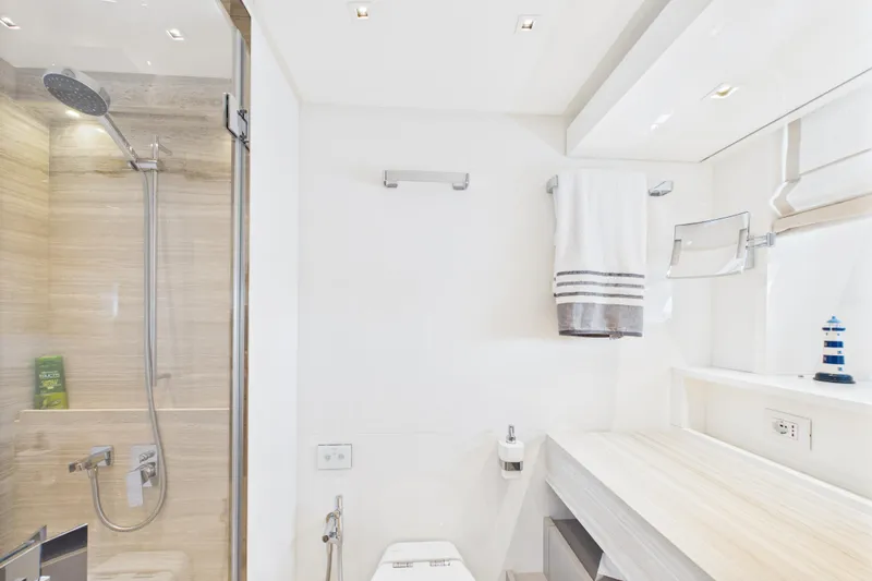  Yacht Photos Pics Luxurious bathroom in 2018 Sanlorenzo SL86 yacht with modern shower and elegant decor.