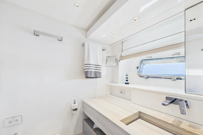  Yacht Photos Pics Luxurious bathroom interior of 2018 Sanlorenzo SL86 yacht, featuring sleek design and modern fixtures.