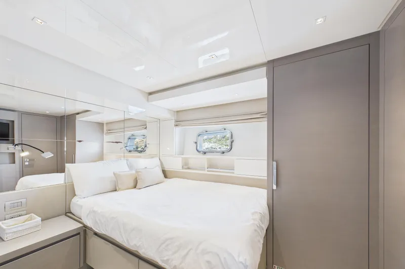  Yacht Photos Pics Luxurious bedroom interior of 2018 Sanlorenzo SL86 yacht with modern design and elegant furnishings.