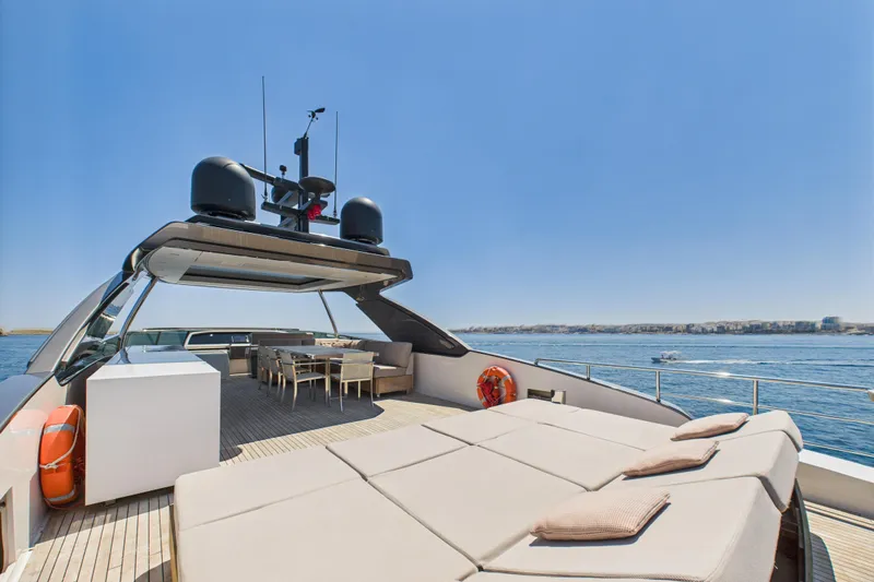  Yacht Photos Pics Luxurious 2018 Sanlorenzo SL86 yacht deck with sun loungers and dining area, ocean view.