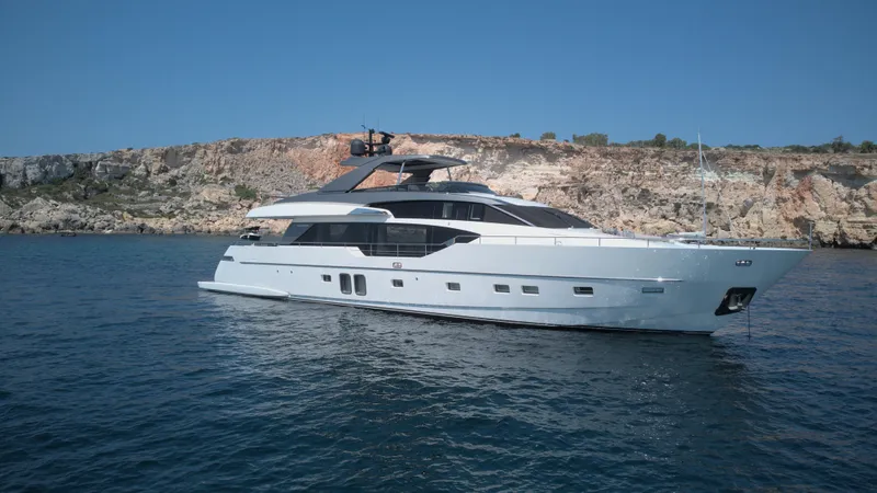  Yacht Photos Pics Luxury 2018 Sanlorenzo SL86 yacht cruising near rocky coastline.