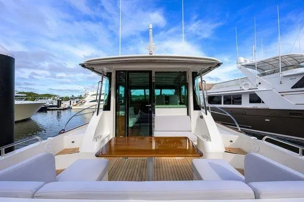  Yacht Photos Pics 2022 Sabre 45 Salon Express yacht with spacious deck and luxurious seating.