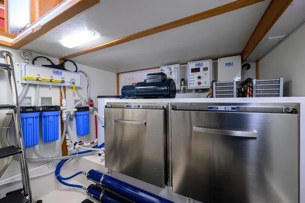  Yacht Photos Pics Engine room of 2022 Sabre 45 Salon Express with advanced filtration systems.