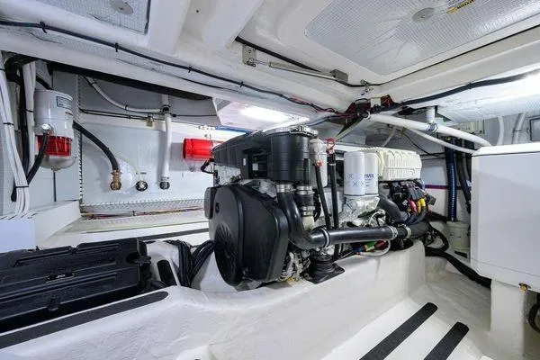  Yacht Photos Pics Engine room of 2022 Sabre 45 Salon Express yacht, showcasing modern equipment and clean design.
