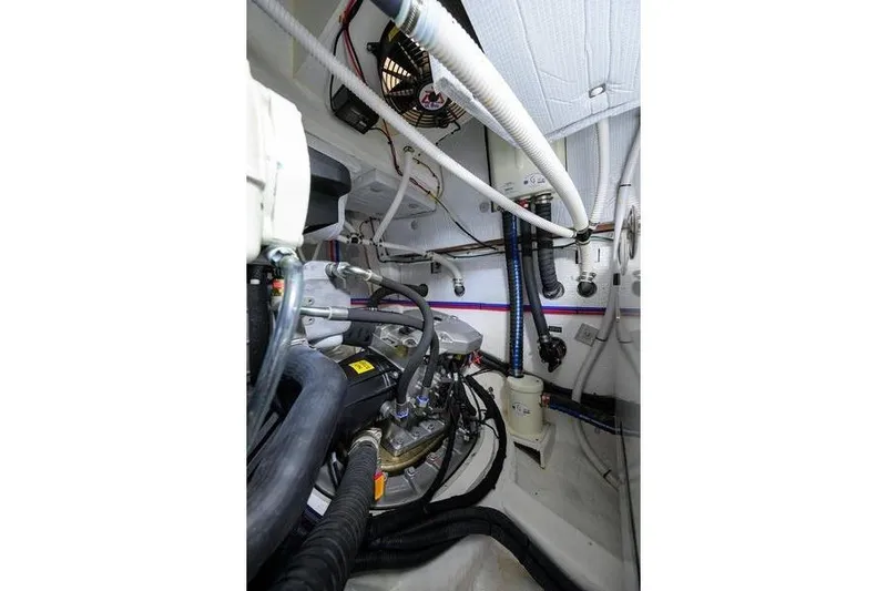  Yacht Photos Pics Engine room of 2022 Sabre 45 Salon Express, showcasing mechanical components and wiring.