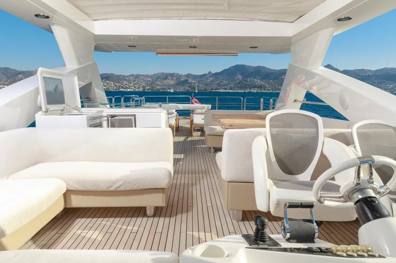 Merci Yacht Photos Pics Luxurious Sunseeker 88 Yacht interior with elegant seating and ocean view, 2010 model.