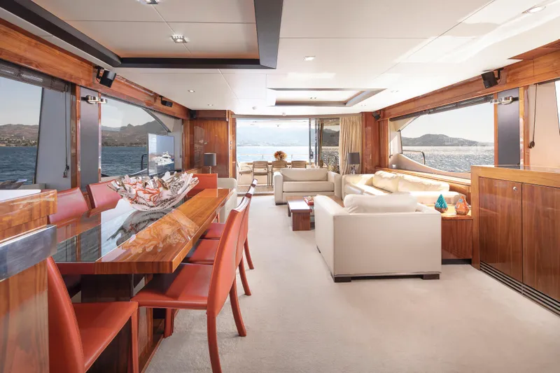 Merci Yacht Photos Pics Luxurious interior of 2010 Sunseeker 88 Yacht with elegant dining and seating areas.
