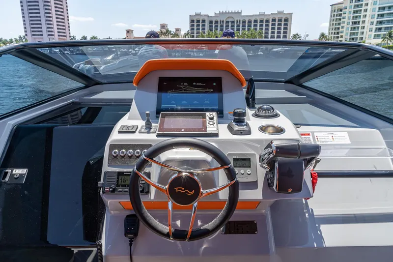  Yacht Photos Pics 2024 Rio Yachts Daytona 35 dashboard with modern controls and steering wheel.