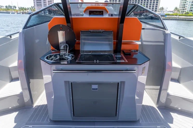  Yacht Photos Pics Outdoor kitchen on 2024 Rio Yachts Daytona 35, featuring grill and sink.