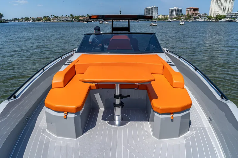  Yacht Photos Pics 2024 Rio Yachts Daytona 35 with vibrant orange seating on a sunny day.