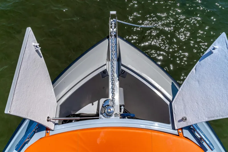  Yacht Photos Pics 2024 Rio Yachts Daytona 35 bow with anchor, open storage, and orange seating.