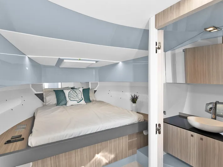  Yacht Photos Pics 2024 Rio Yachts Daytona 35 interior cabin with bed and modern bathroom.